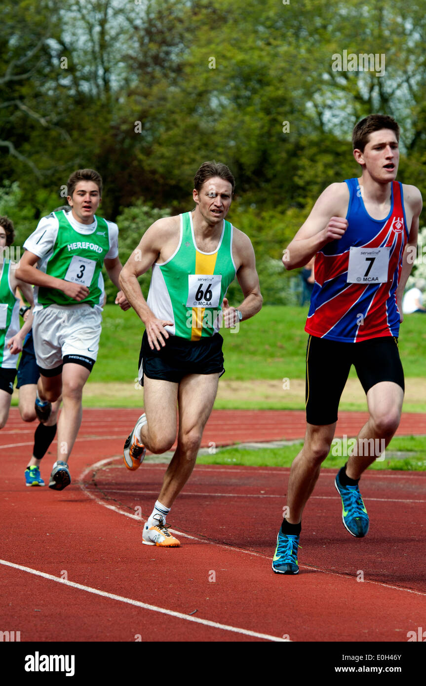 Athletics, runners in men`s 1500m race at club level, UK Stock Photo
